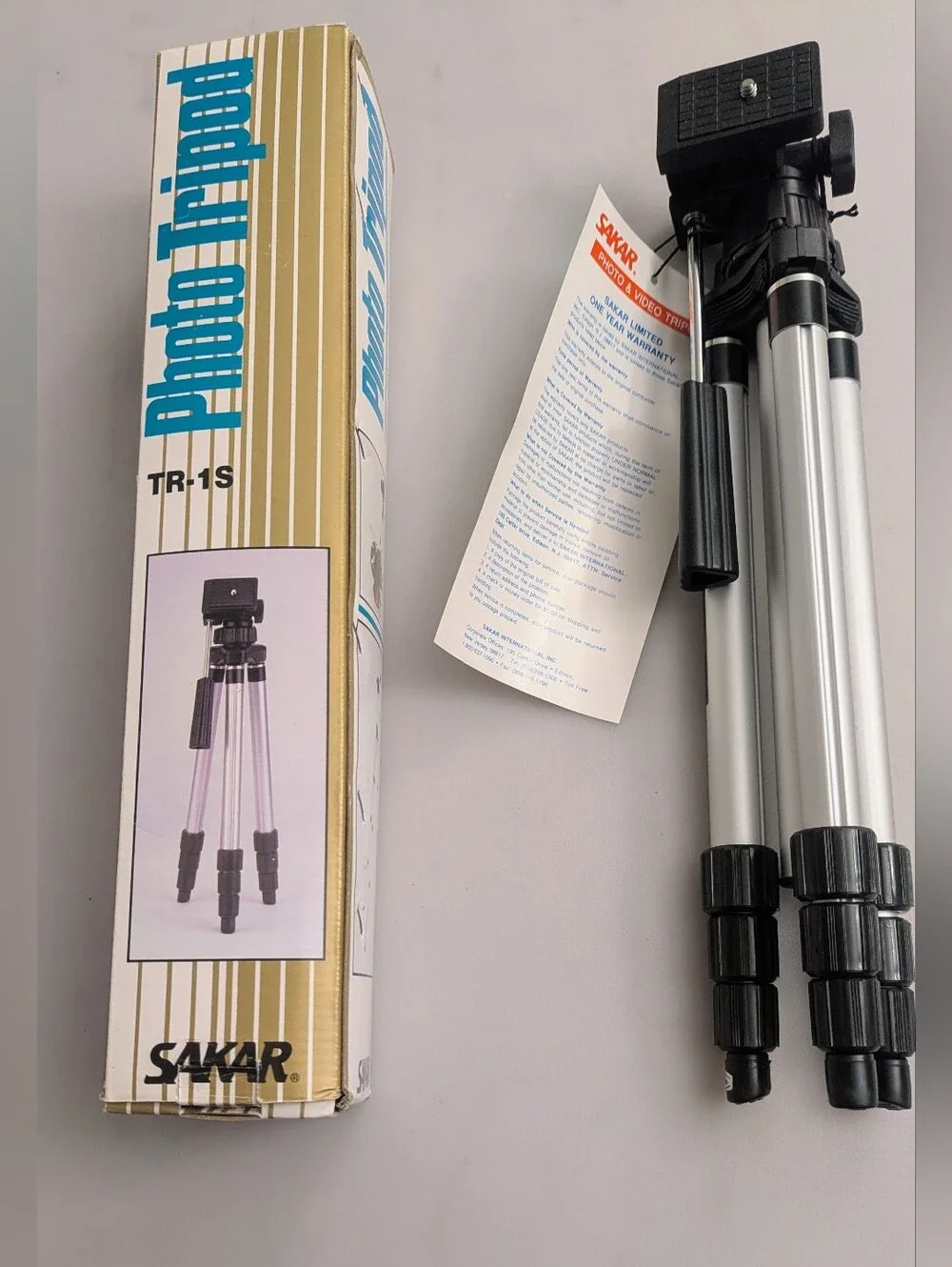 Sakar TR-1S Photo / Video Camera Tripod 4 Section (Extends 50.5”). Original Box.